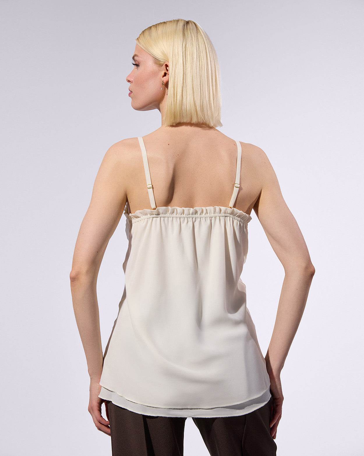 
                    
                      Crepes Flare Top - KERSY STRAUSS
                    
                  