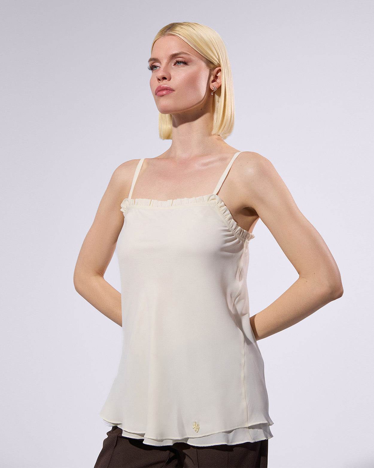 
                    
                      Crepes Flare Top - KERSY STRAUSS
                    
                  