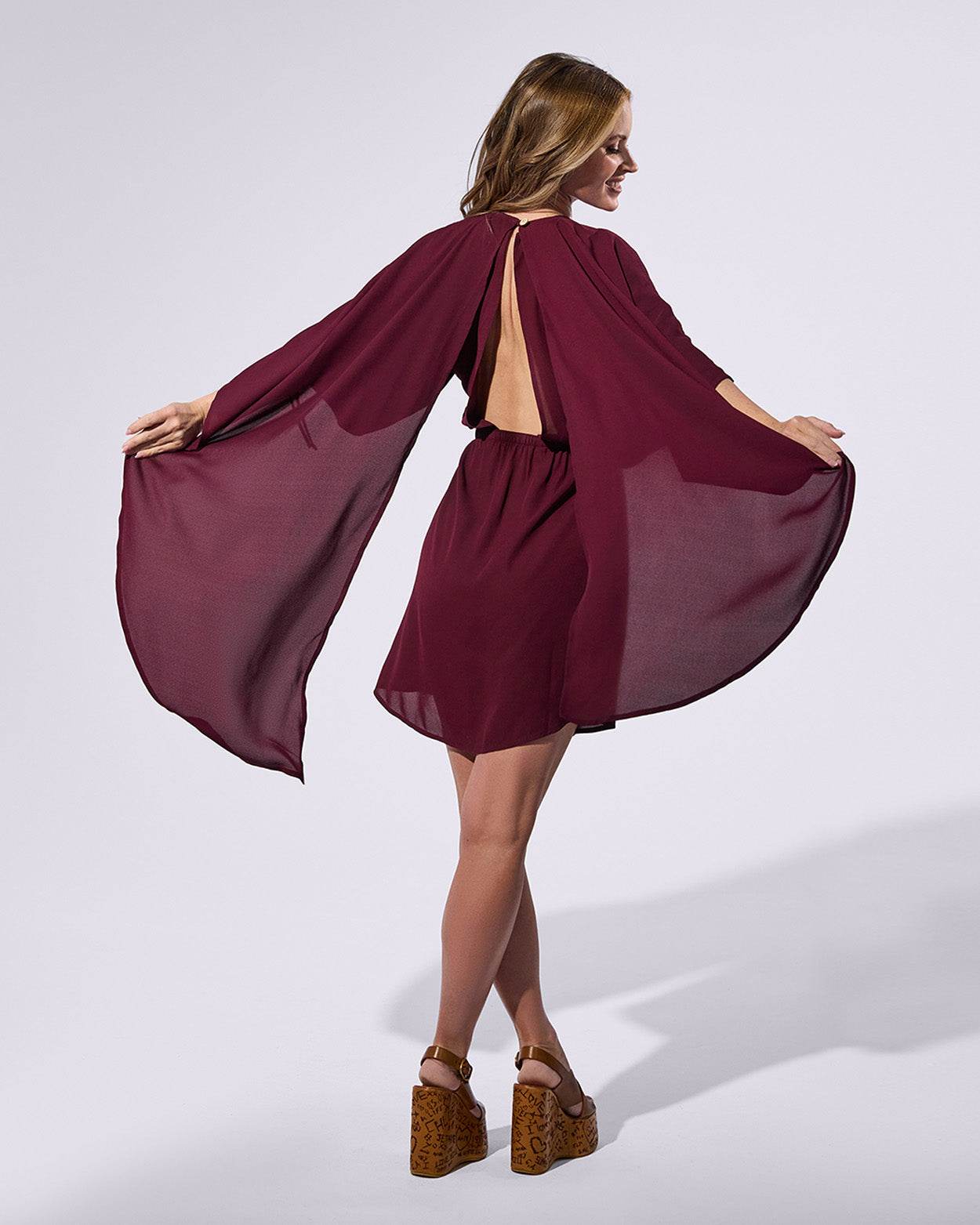 
                    
                      Short Cape Dress - KERSY STRAUSS
                    
                  
