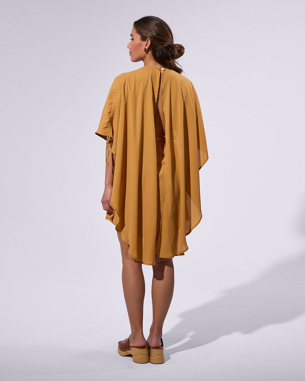 
                    
                      Short Cape Dress - KERSY STRAUSS
                    
                  
