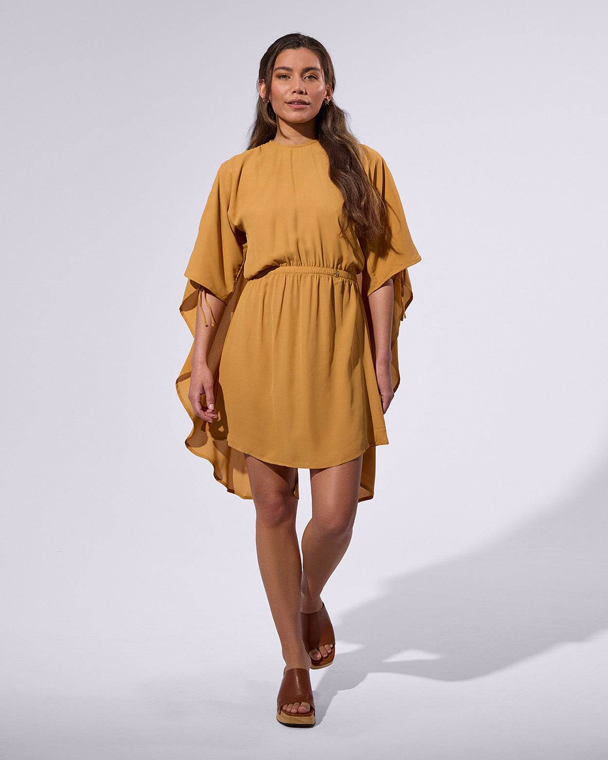 
                    
                      Short Cape Dress - KERSY STRAUSS
                    
                  