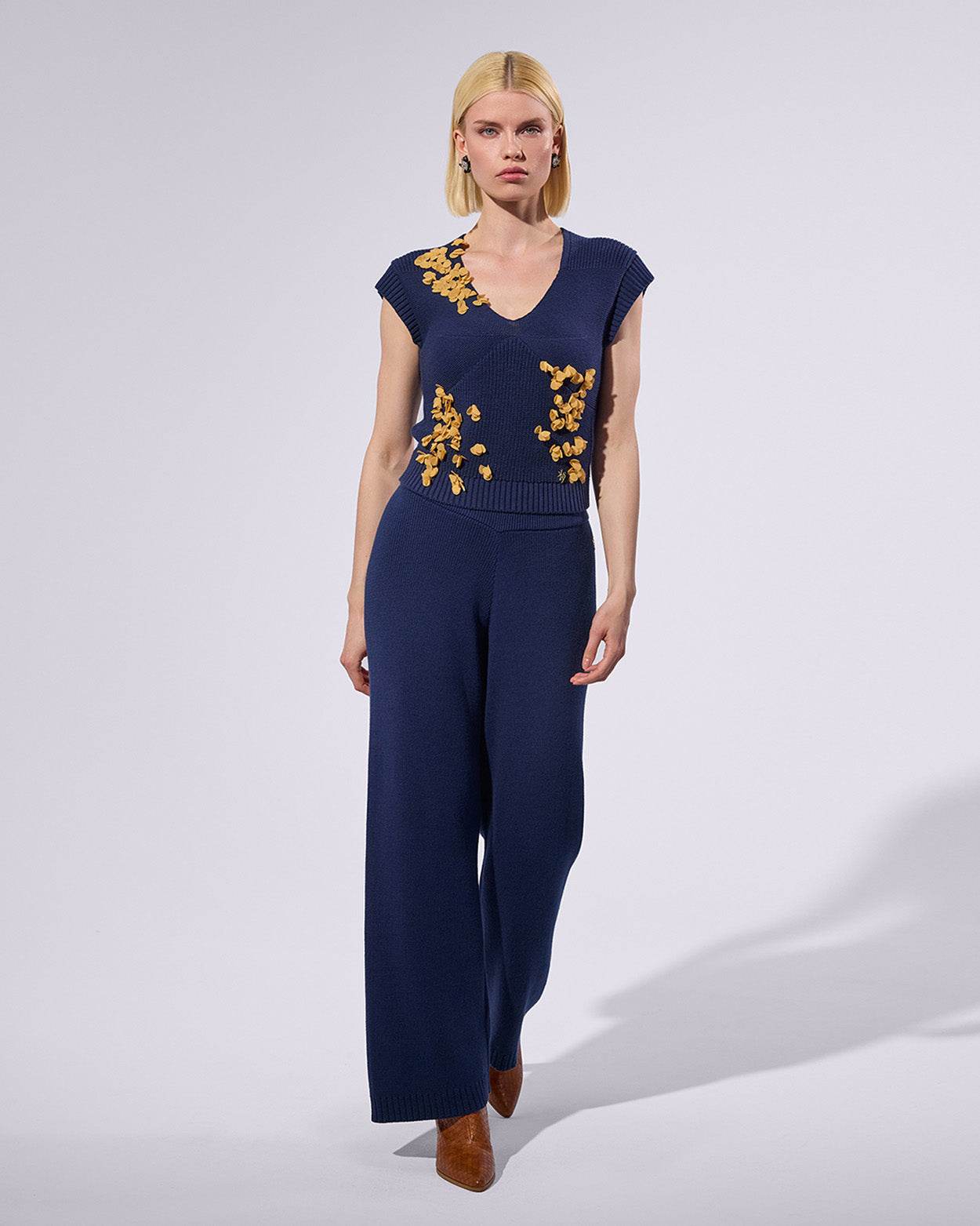 
                    
                      Flare Knit Pants - KERSY STRAUSS
                    
                  